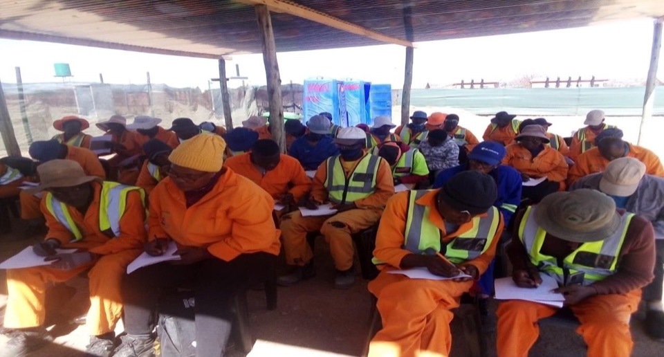 Mocheku Landscapers site crew at a toolbox talk safety briefing