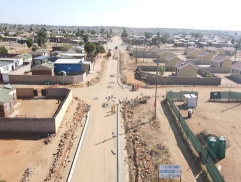 Aerial view of township road construction, Harare project